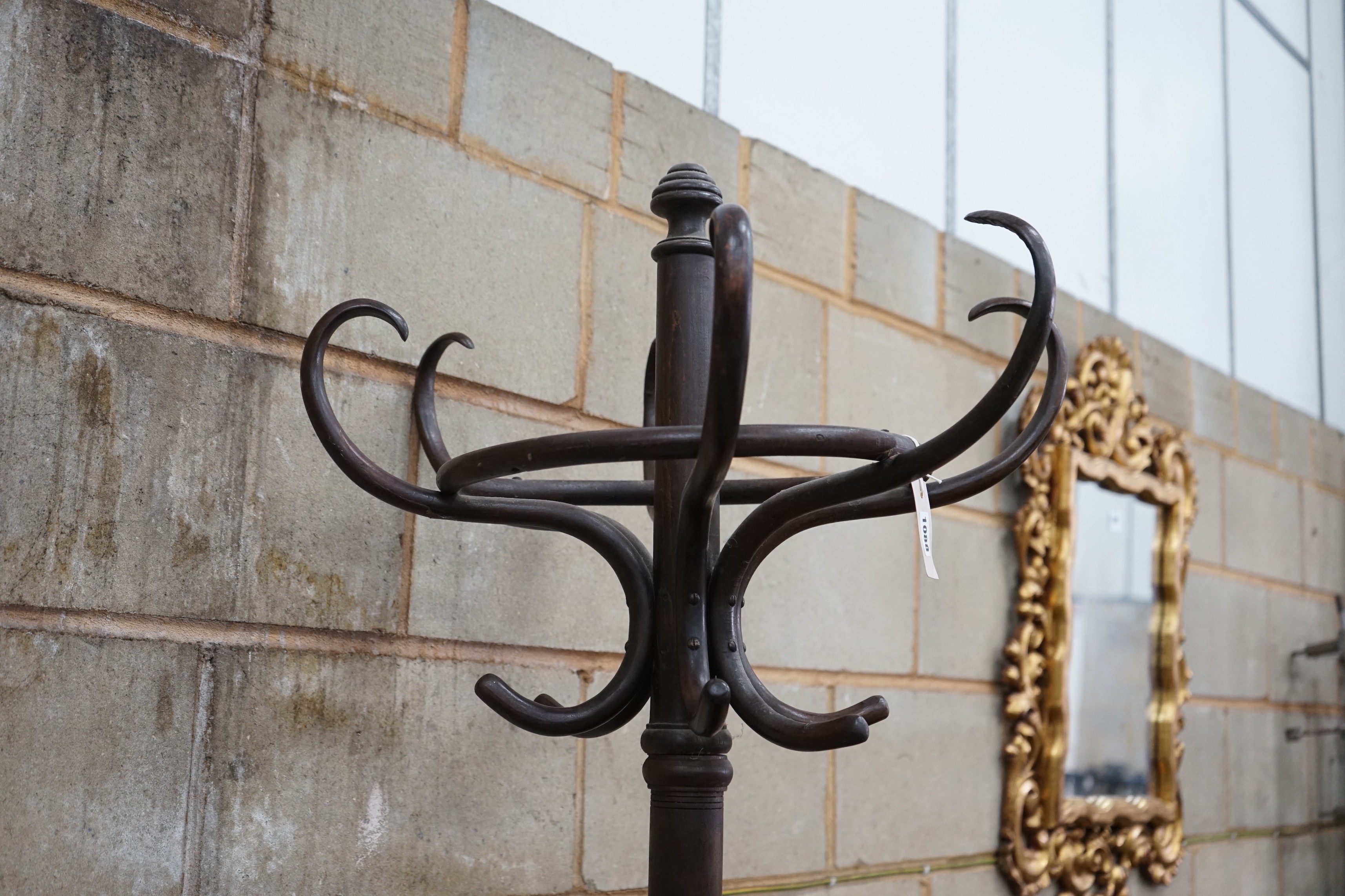 An early 20th century Thonet style beech Bentwood coat and stick stand, height 199cms.